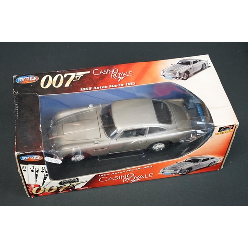 1177 - Three boxed 1/18 scale diecast models to include Joyride 007 James Bond Casino Royale 1965 Aston mar... 