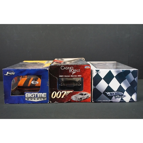 1177 - Three boxed 1/18 scale diecast models to include Joyride 007 James Bond Casino Royale 1965 Aston mar... 