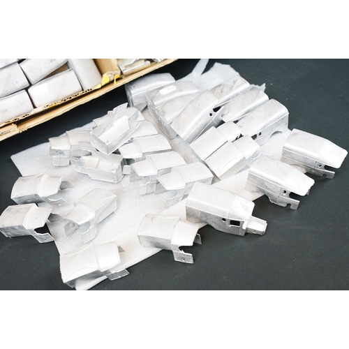 1181 - Quantity of white metal model kits with roofs, rear ends and ladders, all unbuilt and unpainted, wit... 