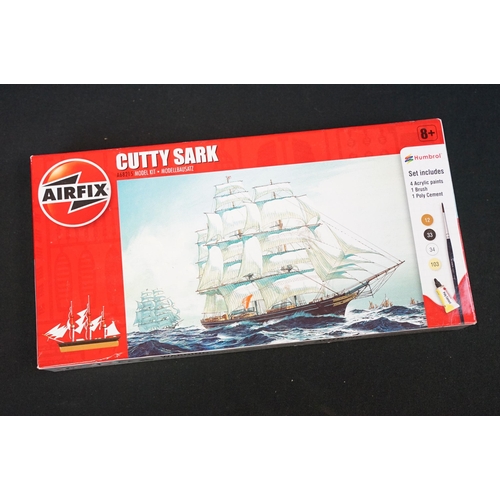 306 - Four boxed plastic model kits to include 1/48 Airfix Hawker Sea Fury FB.11 (appearing complete, part... 