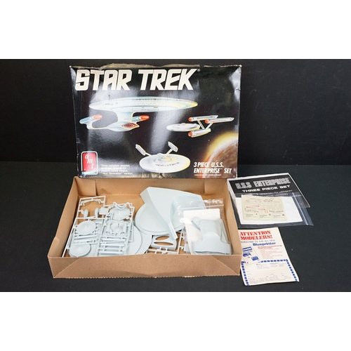 308 - Four boxed AMT / ERTL plastic model kits featuring Star Wars Cantina Action Scene, Star Wars Death S... 