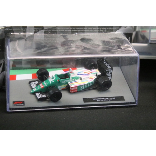 1287 - 48 Sealed Panini 1/43 Formula 1 diecast model cars to include Mario Andretti's 1982 Ferrari 126 C2, ... 