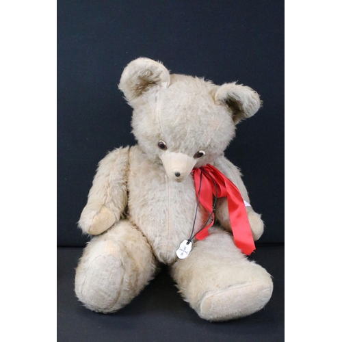 428 - Seven Mid 20th C onwards teddy bears featuring a musical bear, bears showing age related wear, fur p... 