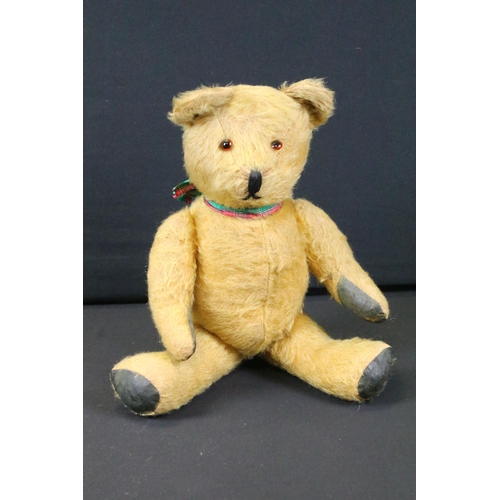 428 - Seven Mid 20th C onwards teddy bears featuring a musical bear, bears showing age related wear, fur p... 