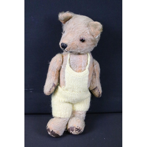 428 - Seven Mid 20th C onwards teddy bears featuring a musical bear, bears showing age related wear, fur p... 