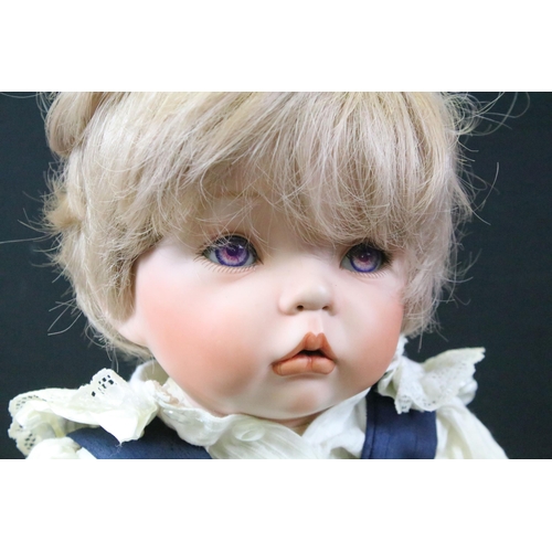 434 - Two Celia Doll Company porcelain artist dolls, limited edition, boy marked KT94 92/200, girl KT94 7/... 