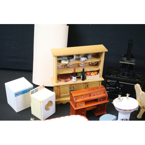 437 - Collection of various dolls house furniture to include dresser, chairs, sofa, table and cutlery, cer... 