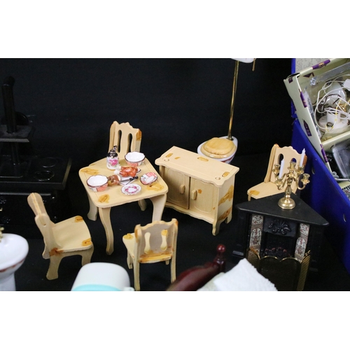 437 - Collection of various dolls house furniture to include dresser, chairs, sofa, table and cutlery, cer... 