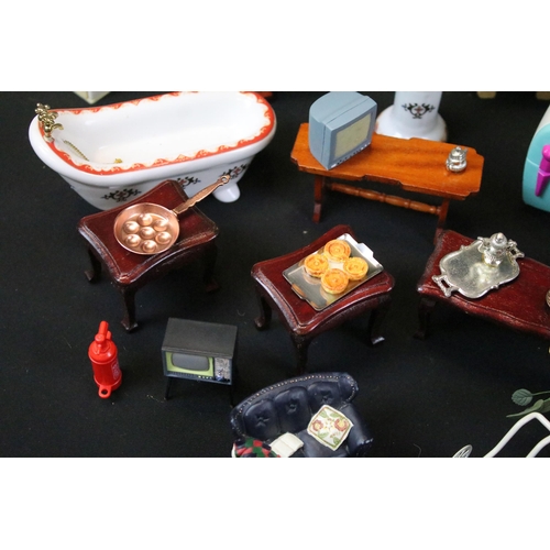 437 - Collection of various dolls house furniture to include dresser, chairs, sofa, table and cutlery, cer... 