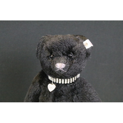 439 - Boxed Steiff Krystina The Swarovski Bear, with COA No. 851 and opened polythene bag, together with a... 