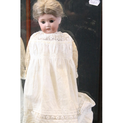 447 - Early 20th C German bisque headed doll possibly Cuno & Otto with grey hair in a french braid, brown ... 