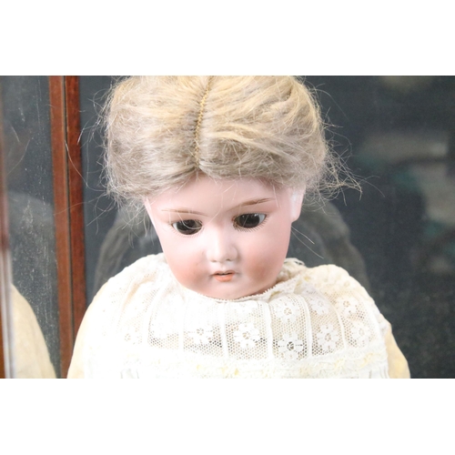 447 - Early 20th C German bisque headed doll possibly Cuno & Otto with grey hair in a french braid, brown ... 