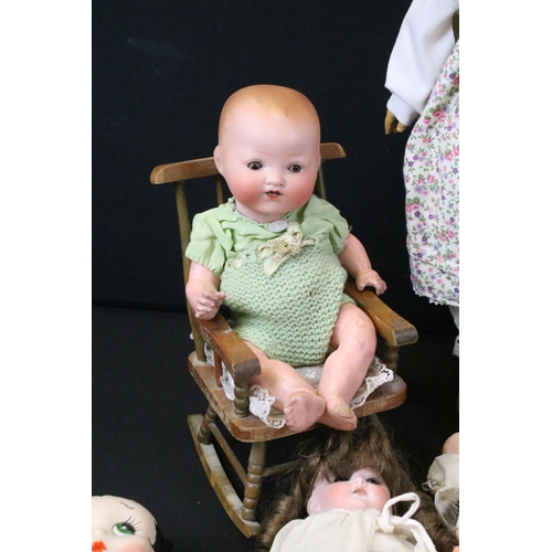 452 - Quantity of various dolls to include mainly bisque headed dolls featuring Armand Marseille examples ... 