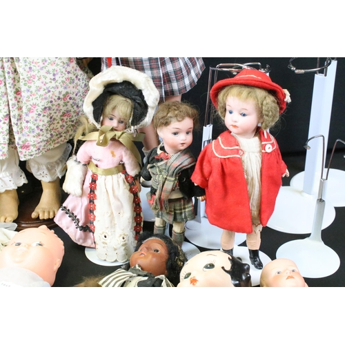 452 - Quantity of various dolls to include mainly bisque headed dolls featuring Armand Marseille examples ... 