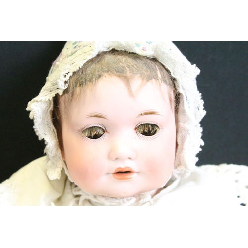 458 - Three Early 20th C German Armand Marseille bisque headed dolls to include black baby doll marked A.M... 