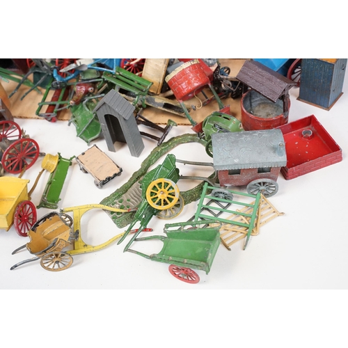 1328 - Large quantity of mainly Britains and some Dinky accessories to include horse carts, push carts, mil... 