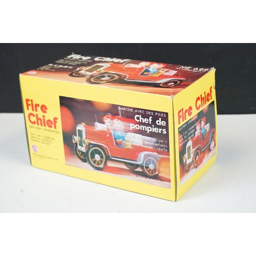 415 - Two fire engine models to include boxed tin plate ME 699 Battery Operated Fire Chief and tin plate f... 