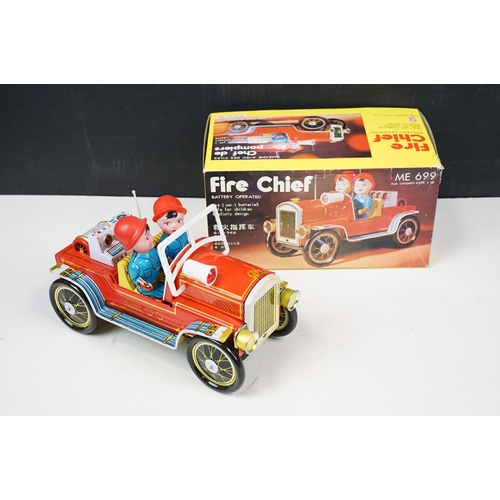 415 - Two fire engine models to include boxed tin plate ME 699 Battery Operated Fire Chief and tin plate f... 