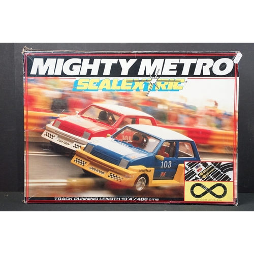 418 - Two boxed Scalextric sets to include Mighty Metro C880 set with both slot cars and Triang Set 32 wit... 