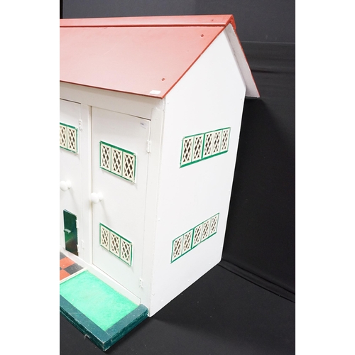 460 - Large scratch built dolls house with white exterior and red roof with three large doors to reveal in... 