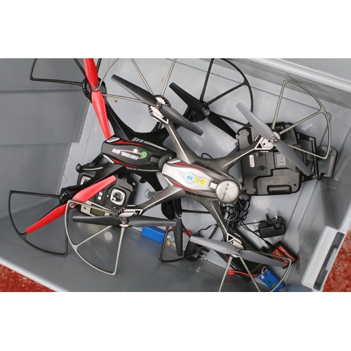 389 - Radio Control - Collection of eight R/C helicopters / drones to include Flying Gadgets X-Cam Quadcop... 