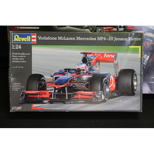 336 - 15 Boxed racing related plastic model kits of varying scales to include 1/24 Revell Vodafone Mclaren... 