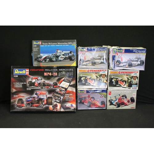 336 - 15 Boxed racing related plastic model kits of varying scales to include 1/24 Revell Vodafone Mclaren... 