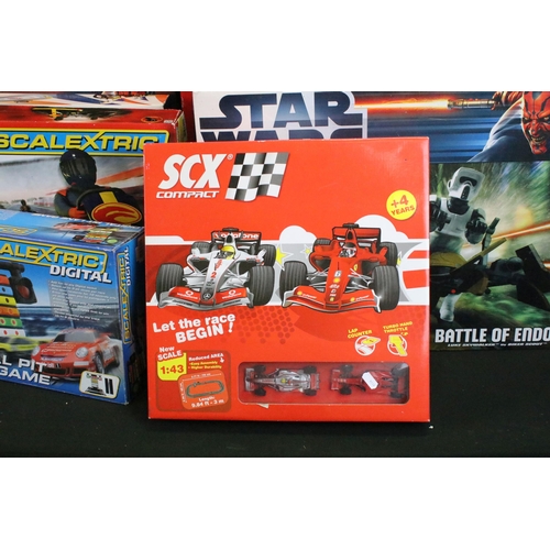 395 - Eight boxed Scalextric and SCX slot car sets to include Demolition Derby Metal Alien Vs White Skull,... 