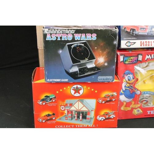 397 - Collection of 16 boxed toys and games to include Grandstand Astro Wars Electronic Game, Corgi CC9660... 