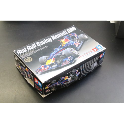 336 - 15 Boxed racing related plastic model kits of varying scales to include 1/24 Revell Vodafone Mclaren... 