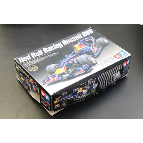 336 - 15 Boxed racing related plastic model kits of varying scales to include 1/24 Revell Vodafone Mclaren... 