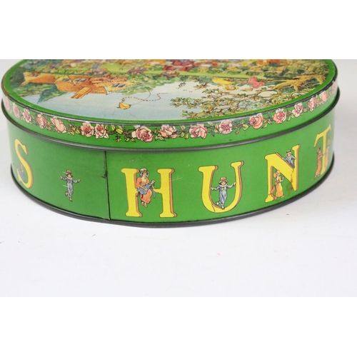 135A - Huntley & Palmers risque Edwardian garden party circular biscuit tin, circa 1980, 20cm diameter