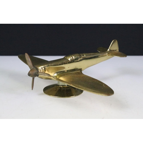 137A - Brass desk top model of an airplane on stand