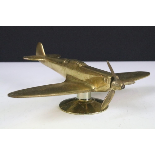 137A - Brass desk top model of an airplane on stand