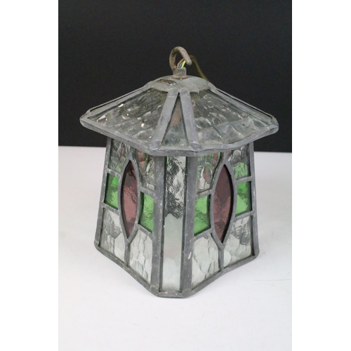 139 - Arts and crafts style leaded glass hanging lantern with clear and coloured glass panels, 22cm high