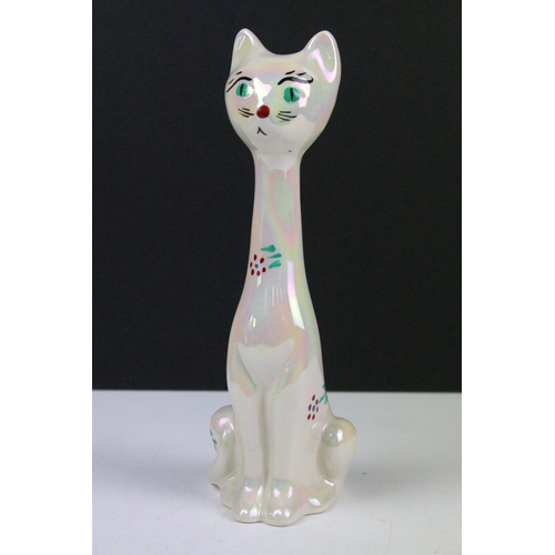 82 - Collection of ceramic figurines to include four Beswick cat figurines, a Beswick Mr Jeremy Fisher, a... 