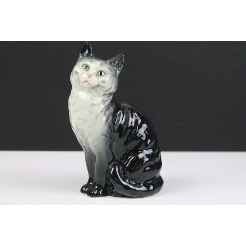 82 - Collection of ceramic figurines to include four Beswick cat figurines, a Beswick Mr Jeremy Fisher, a... 