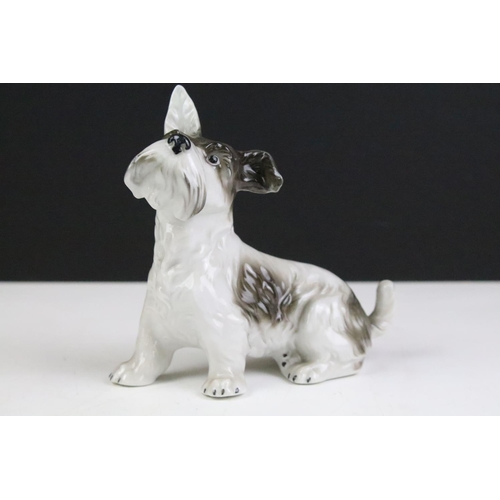 90 - Collection of ceramics dog figurines to include B&G Denmark dog, Royal Doulton figurines including c... 