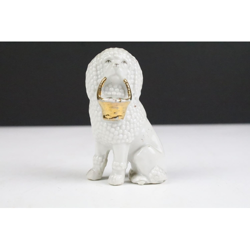 90 - Collection of ceramics dog figurines to include B&G Denmark dog, Royal Doulton figurines including c... 