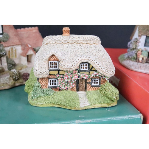 99 - Collection of ten boxed Lilliput Lane models to include 119 The Almonry, L2133 The Old Forge, L2022 ... 