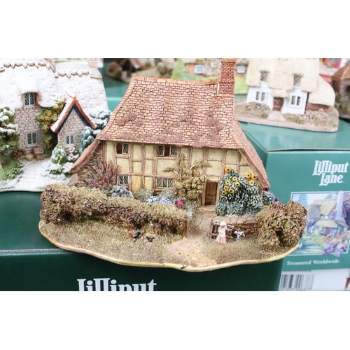 99 - Collection of ten boxed Lilliput Lane models to include 119 The Almonry, L2133 The Old Forge, L2022 ... 