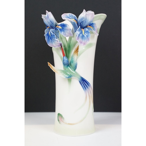 12 - Franz porcelain vase moulded in relief with blue orchids and a Hummingbird, numbered FZ01203, approx... 
