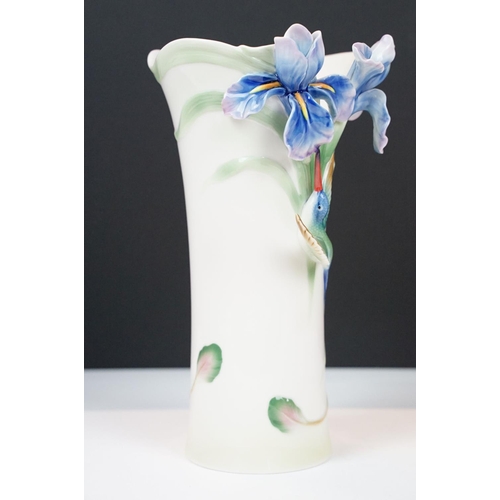 12 - Franz porcelain vase moulded in relief with blue orchids and a Hummingbird, numbered FZ01203, approx... 