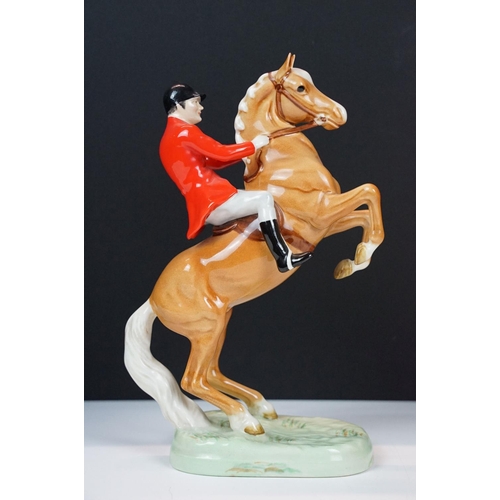 2 - Beswick Huntsman on Rearing Palomino, no. 868, approx 24cm high, Beswick label, impressed & printed ... 