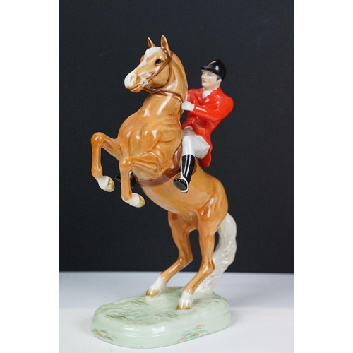 2 - Beswick Huntsman on Rearing Palomino, no. 868, approx 24cm high, Beswick label, impressed & printed ... 