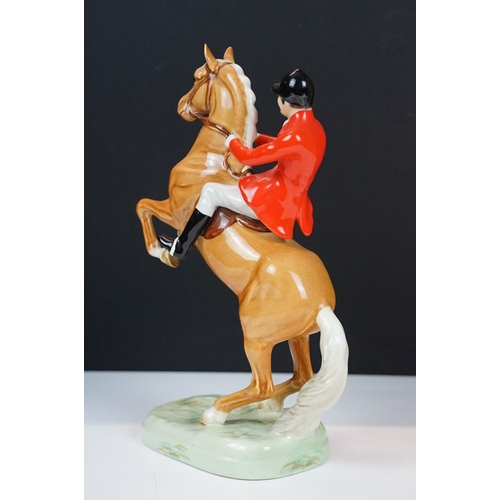 2 - Beswick Huntsman on Rearing Palomino, no. 868, approx 24cm high, Beswick label, impressed & printed ... 