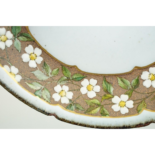 20 - Japanese studio pottery bowl of circular form, the border decorated with white & yellow flowers, stu... 