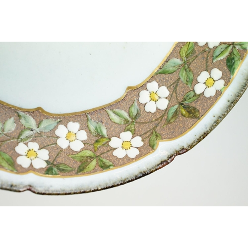 20 - Japanese studio pottery bowl of circular form, the border decorated with white & yellow flowers, stu... 