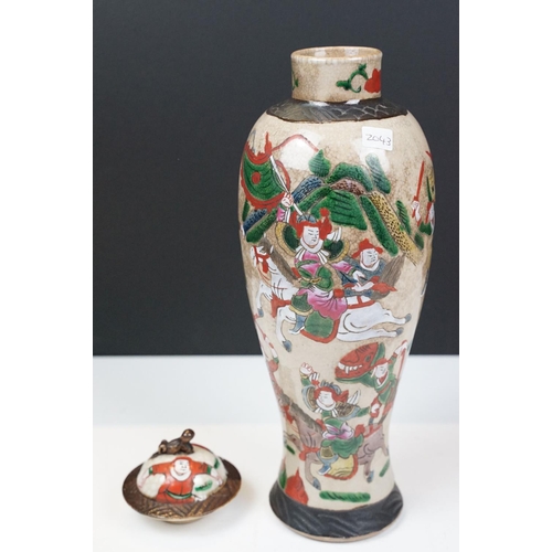 25 - Chinese famille rose lidded vase of inverted baluster form decorated with a battle scene, character ... 