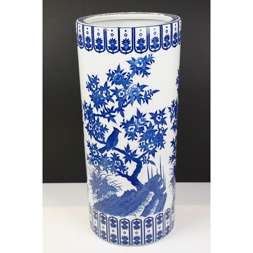 29 - Oriental blue & white porcelain cylindrical floor vase decorated with bird perched on blossoming bra... 